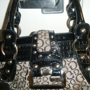 Guess Purse measured 14" W X 9"H